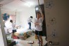 Дома нуждающихся жителей в Радин Мас получат антимоскитную краску в течение следующих двух лет